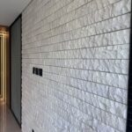 marfim etrusco com aço corten